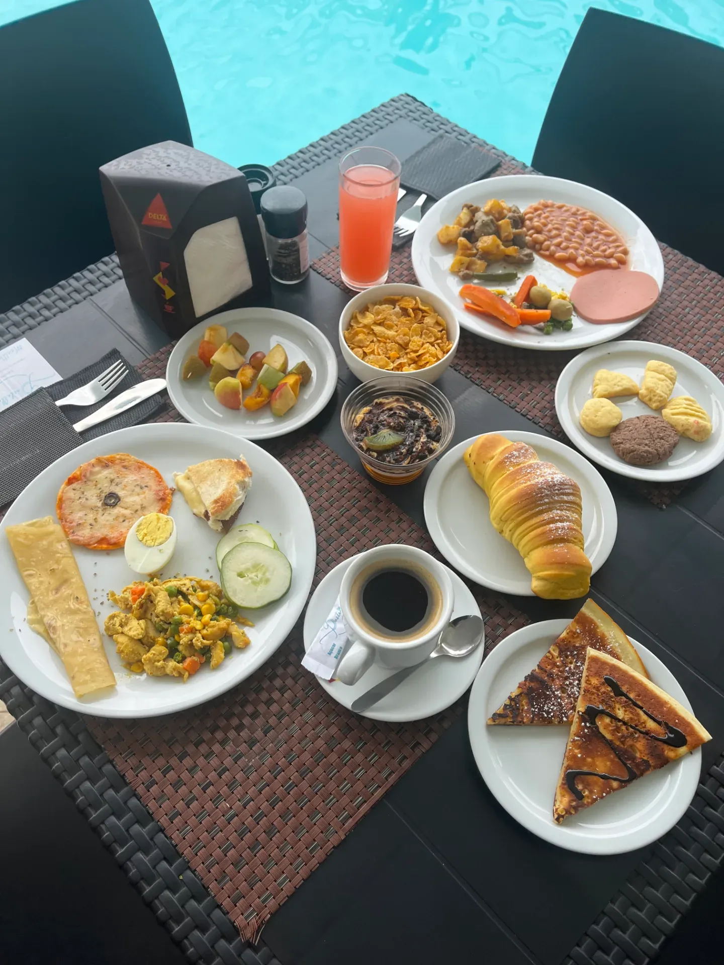 Pastello breakfast buffet spread by the pool